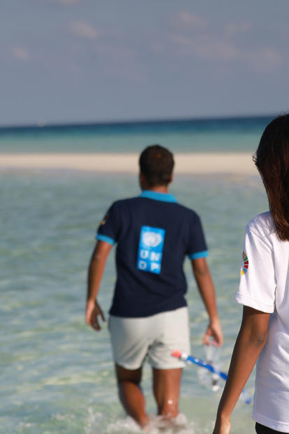 Couple walking in the water